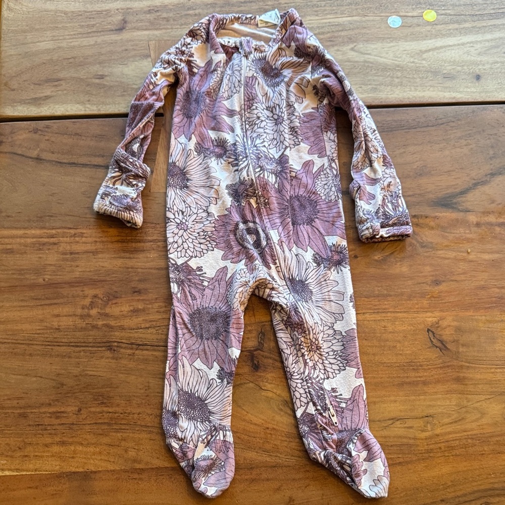 Kate Quinn pink sunflower footie